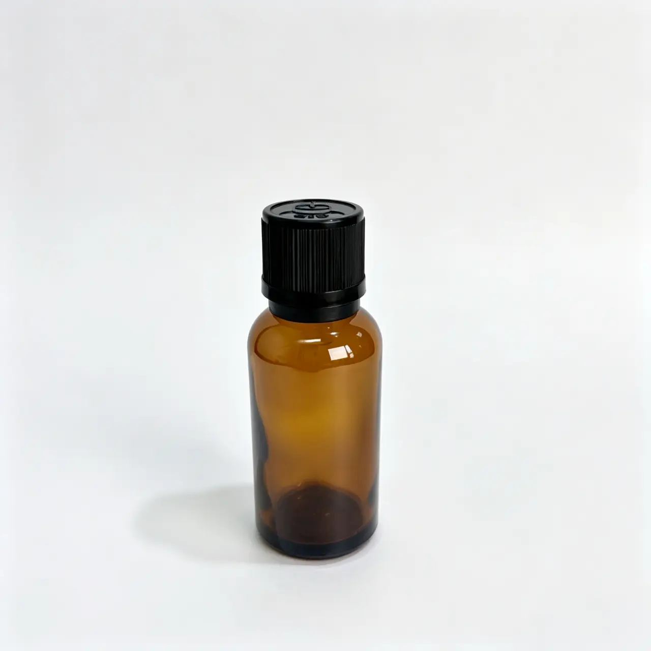 Front view of the 30ml Euro dropper essential oil bottle assembled with a black screw cap