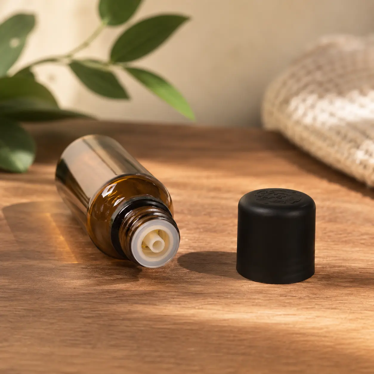 30ml Euro dropper essential oil bottle with black screw cap presented in an essential oil packaging setting
